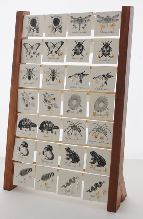 Natural History Rack Display - gold and silver